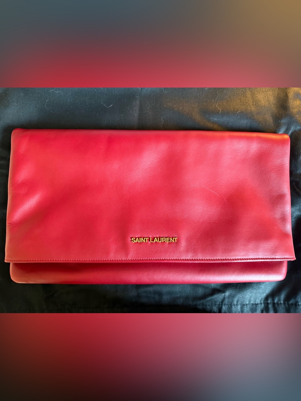 saint laurent foldover clutch in red